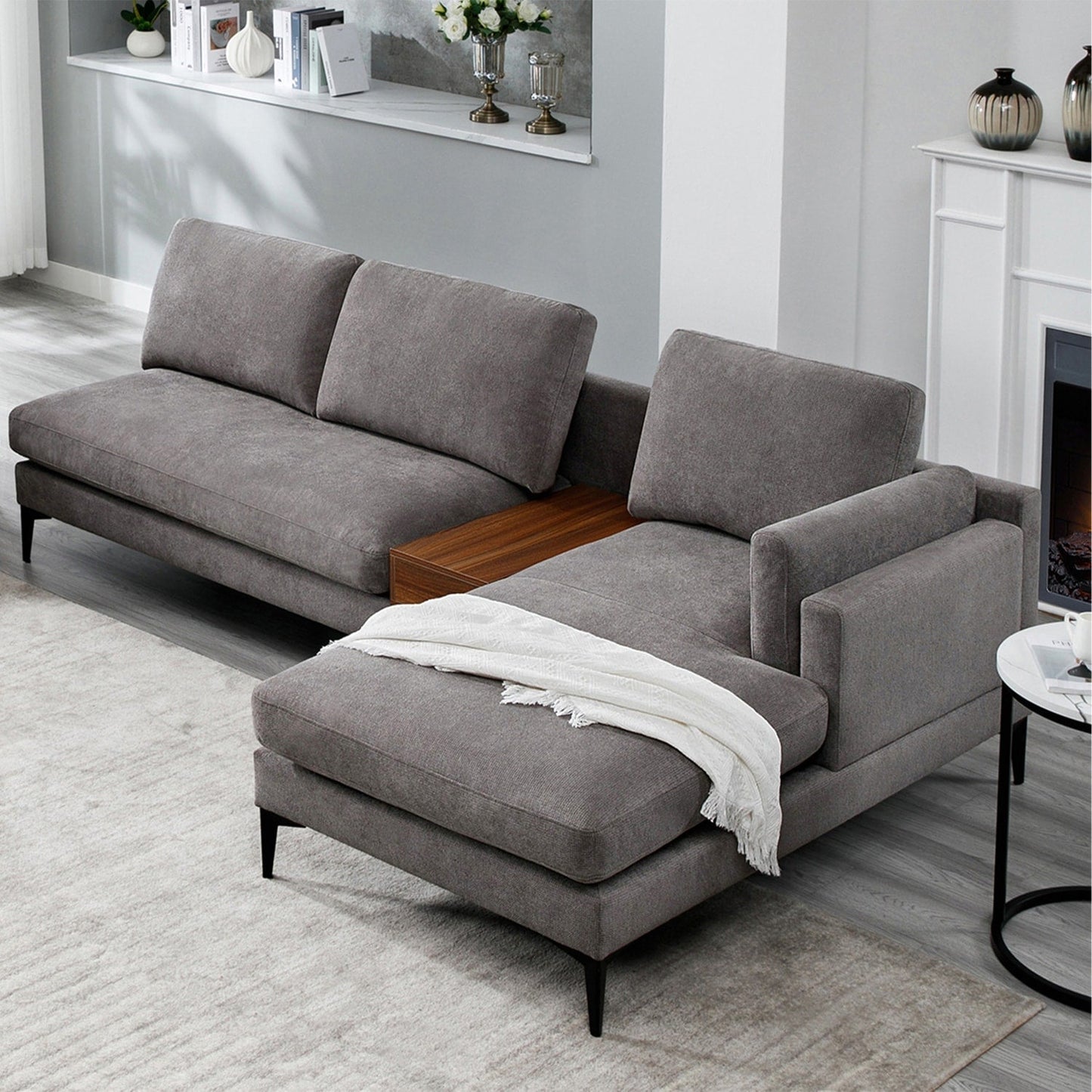 Canapé modulable en L avec un design réversible et un coffre décoratif en bois intégré