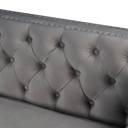 Canapé sectionnel capitonné en velours pour salon