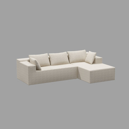 Canapé sectionnel luxueux et confortable de couleur crème