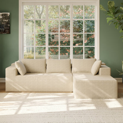 Canapé sectionnel luxueux et confortable de couleur crème