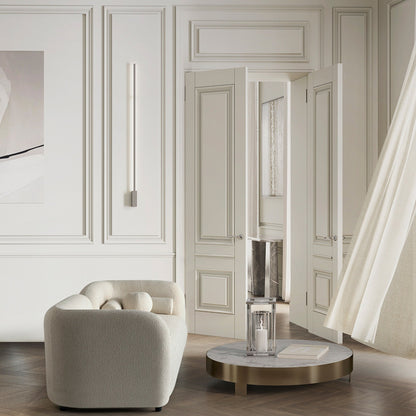 Canapé Milet de luxe moderne en tissu bouclé avec accoudoirs incurvés