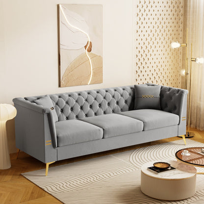 Canapé moderne en velours capitonné, canapé 3 places style milieu de siècle, pieds et coussins en métal doré, élégant canapé de style Chesterfield.