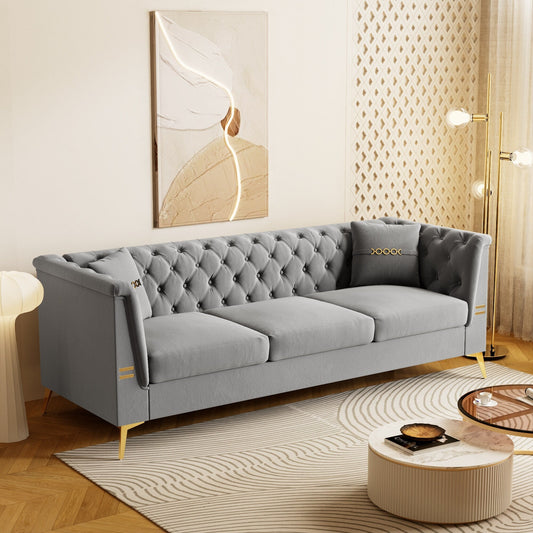 Canapé moderne en velours capitonné, canapé 3 places style milieu de siècle, pieds et coussins en métal doré, élégant canapé de style Chesterfield.