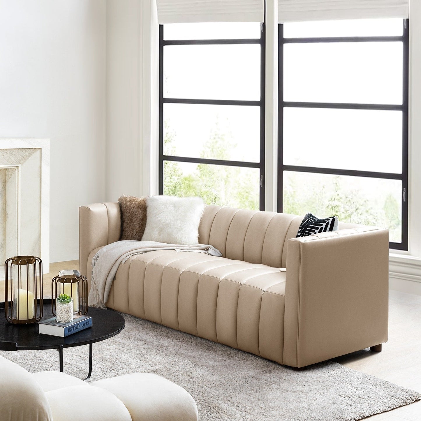 Canapé incurvé moderne Olinto en cuir véritable de 83 pouces avec dossier à canaux par HULALA HOME