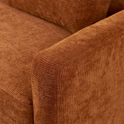 Canapé causeuse en chenille orange avec coussins de dossier et oreillers