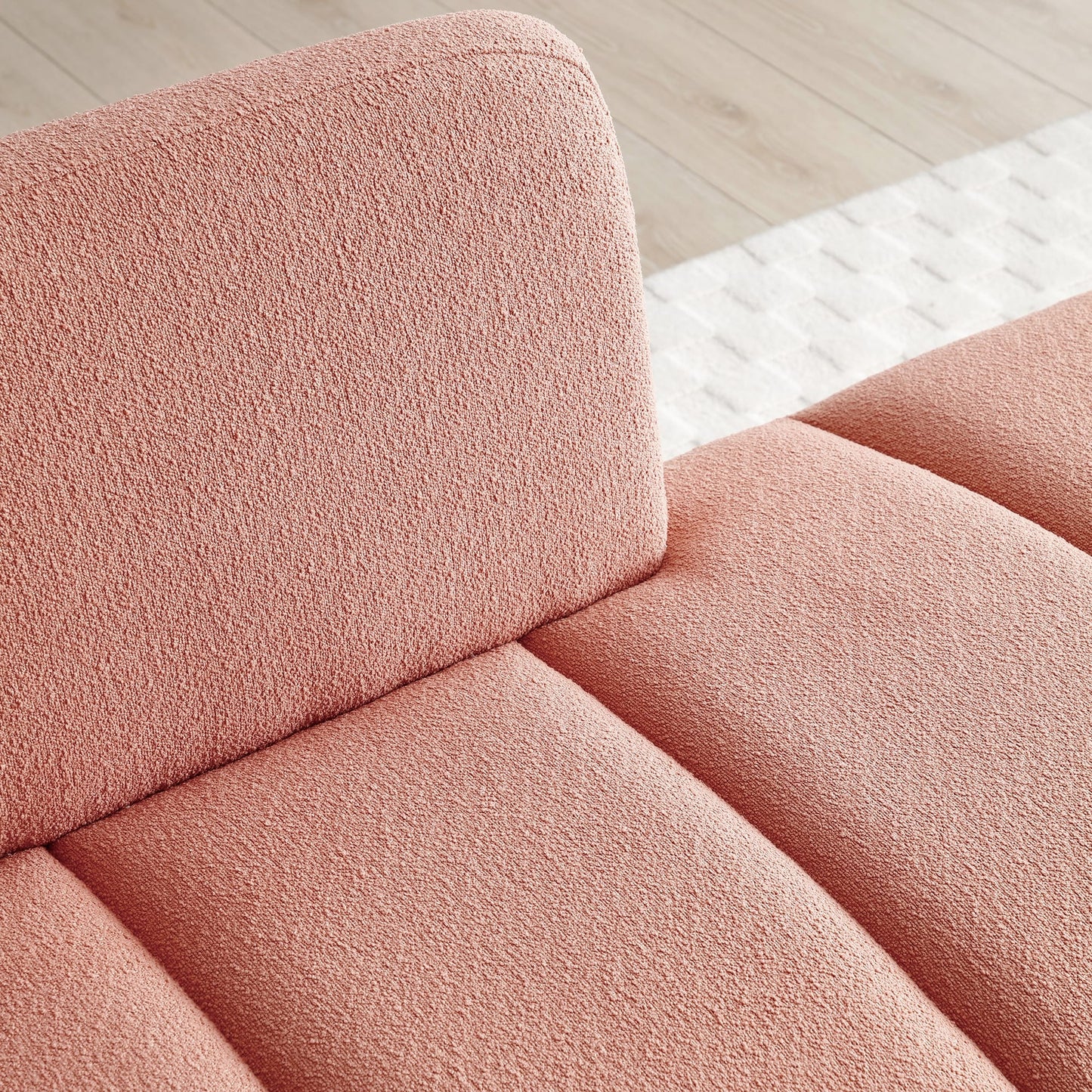 Banc causeuse rembourré rose avec pieds dorés