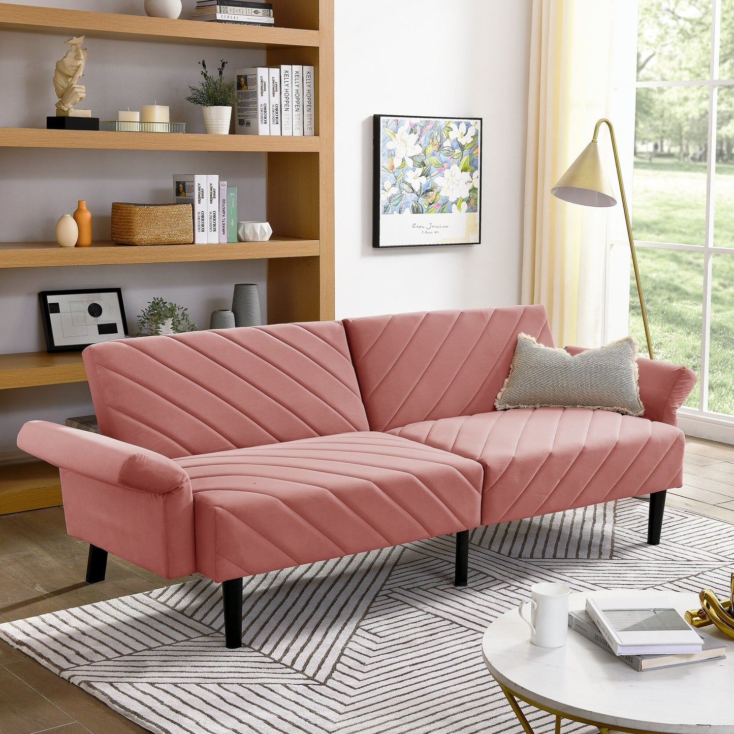 Canapé-lit futon convertible capitonné en velours rose