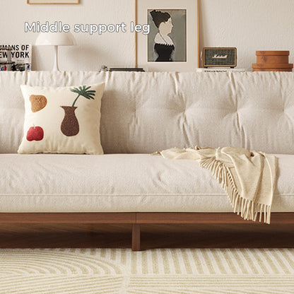 Canapé rectangulaire trois places Romision en lin beige avec accoudoirs évasés