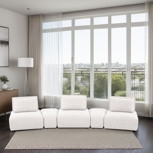 Canapé modulable incurvé 3 places Stavan, boucle blanche, dossiers réglables