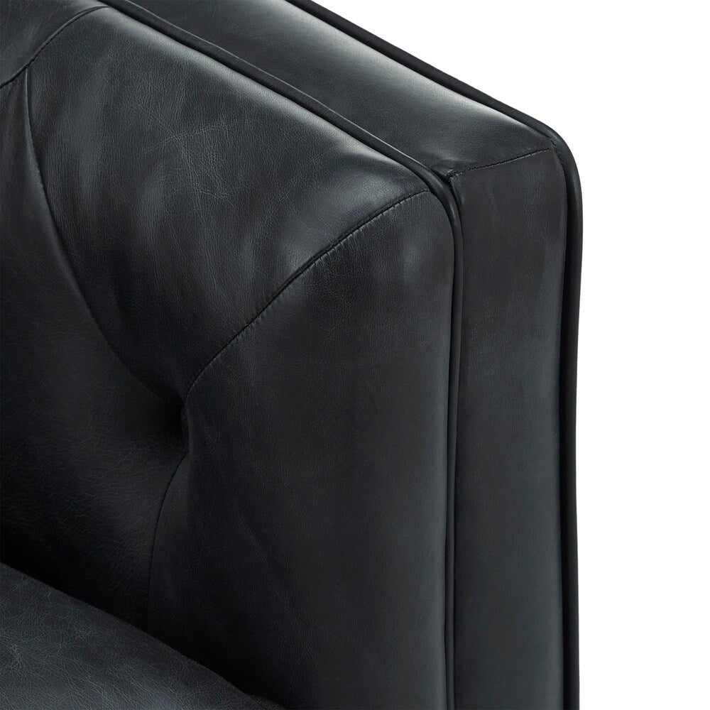 Canapé-causeuse Tullio en cuir noir capitonné par iNSPIRE Q Modern