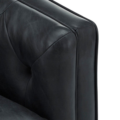 Canapé-causeuse Tullio en cuir noir capitonné par iNSPIRE Q Modern