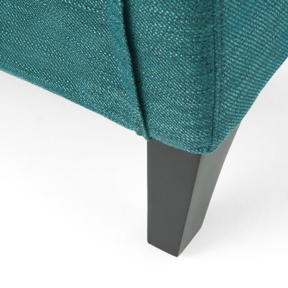 Fauteuil inclinable moderne en tissu bleu sarcelle avec repose-pieds, détails cloutés et pieds en bois de bouleau