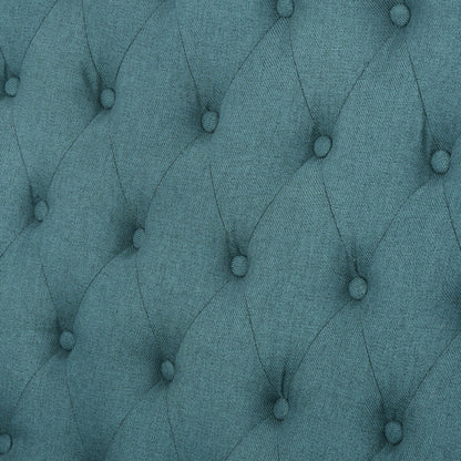 Canapé à oreilles hautes capitonné en velours bleu sarcelle