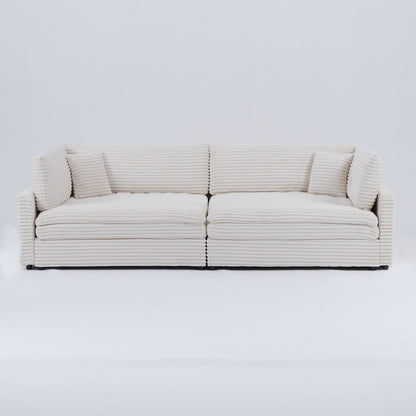 Le canapé en velours côtelé de 112 pouces, avec deux coussins et quatre dossiers