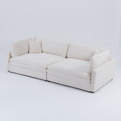 Le canapé en velours côtelé de 112 pouces, avec deux coussins et quatre dossiers