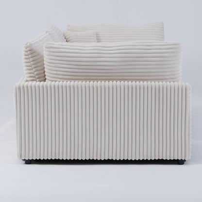 Le canapé en velours côtelé de 112 pouces, avec deux coussins et quatre dossiers