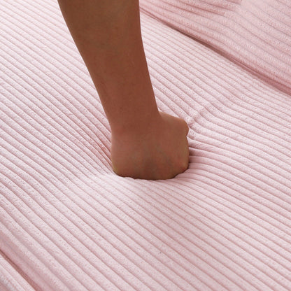 Ce canapé-lit en velours côtelé de 66 pouces peut basculer entre les deux formes confortables