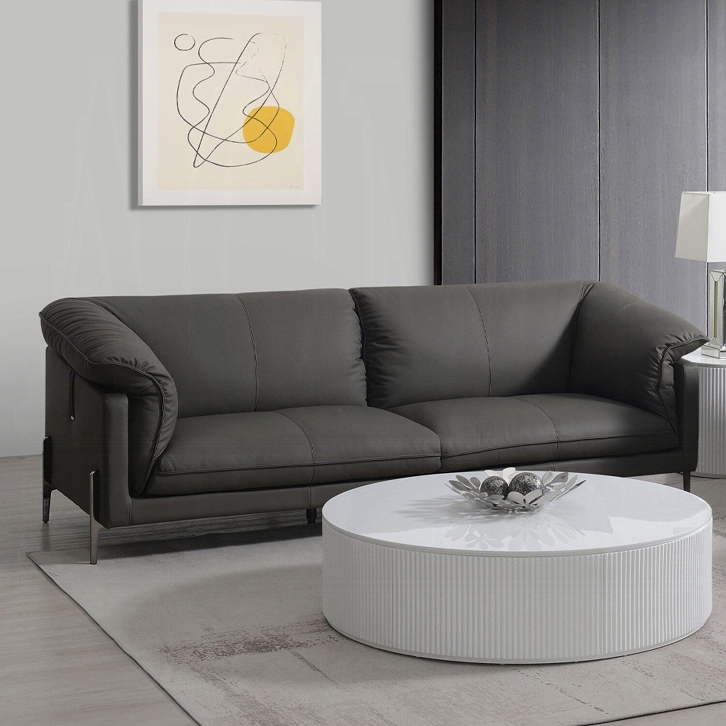 Canapé rembourré en cuir pleine fleur avec pieds en métal noir