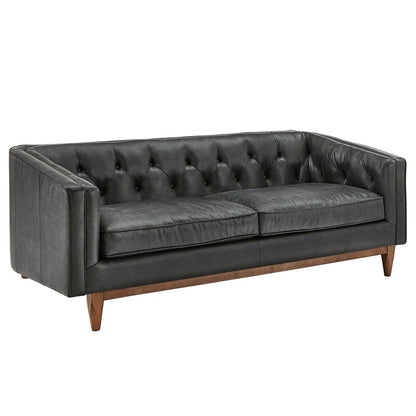 Canapé-causeuse Tullio en cuir noir capitonné par iNSPIRE Q Modern