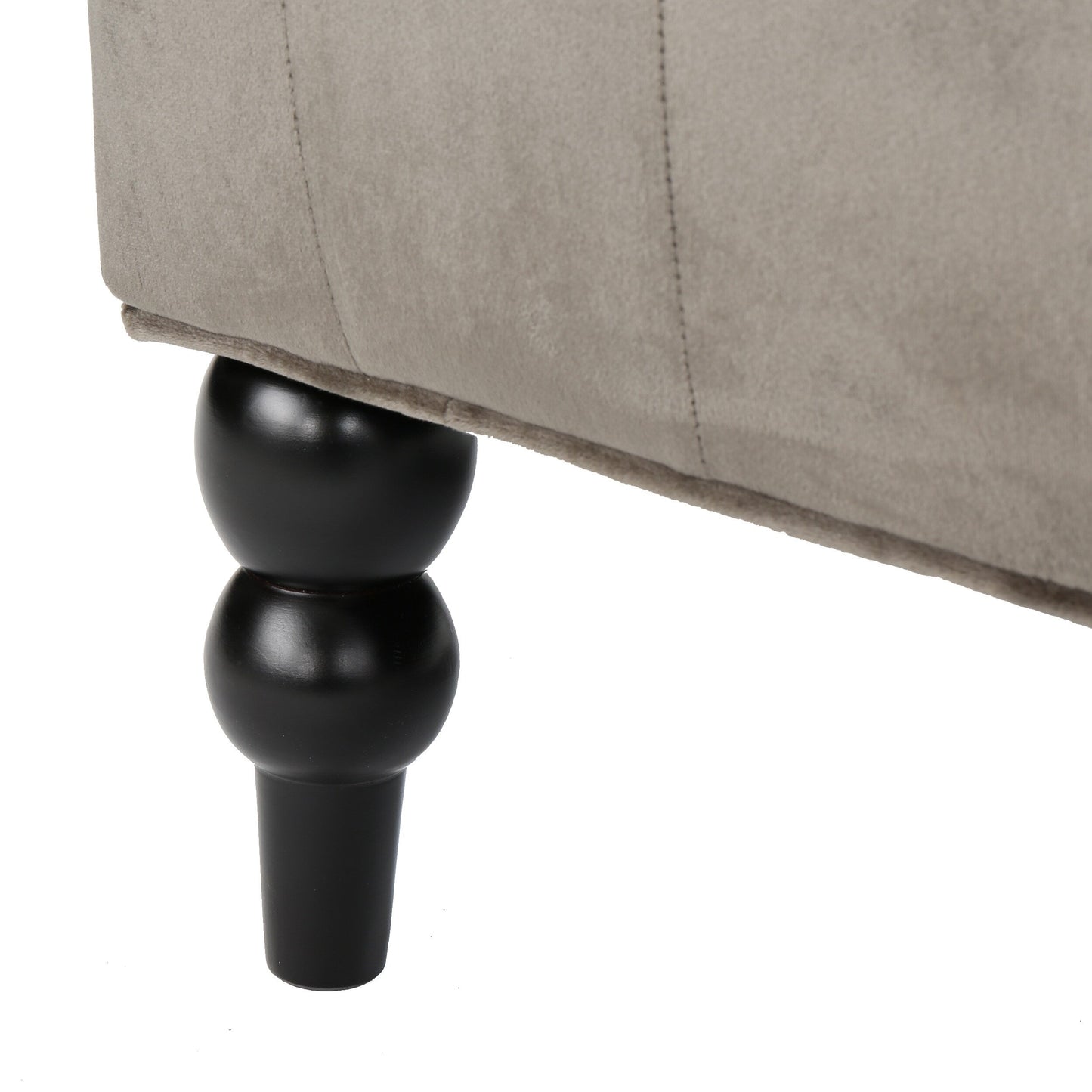 Canapé à oreilles hautes capitonné à boutons en velours