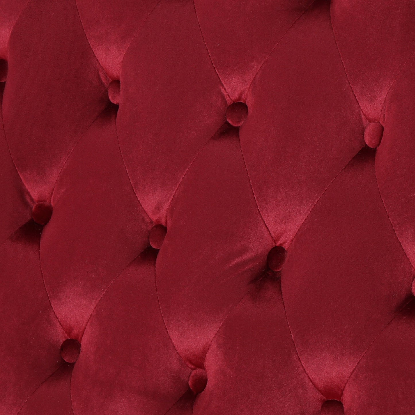 Canapé à oreilles hautes capitonné à boutons en velours