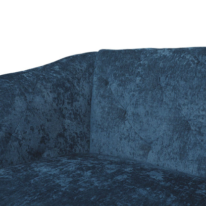 Canapé capitonné en velours avec accoudoirs évasés et siège profond