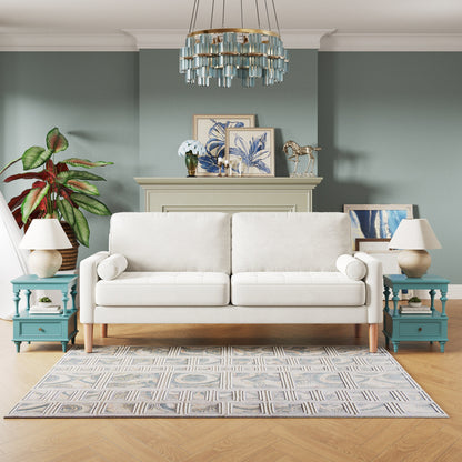 Canapé 3 places rembourré blanc 67,7 avec coussins en mousse haute densité, structure en bois massif et assemblage sans outil.